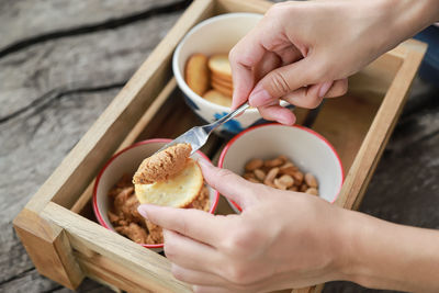 High angle view of woman preparing food