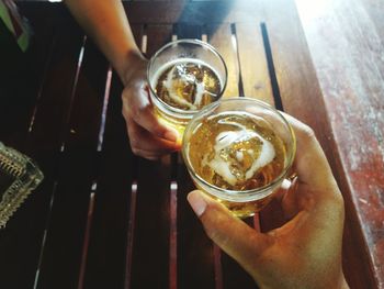 Close-up of hand holding drink