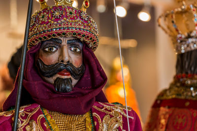 Close-up portrait of man wearing mask