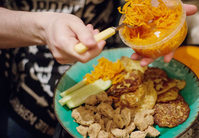 Close-up of man eating food