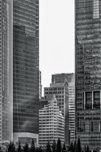 Low angle view of buildings against clear sky