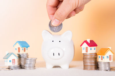 Close-up of hands against white background