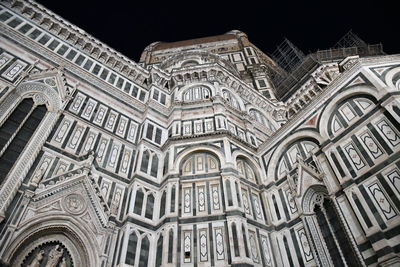 Low angle view of historical building against sky at night