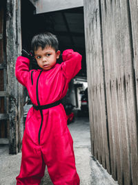 Cute bot wearing uniform standing outdoors