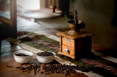 Close-up of coffee beans on table