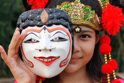 Close-up portrait of mask dancer women