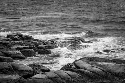 Scenic view of rocks in sea