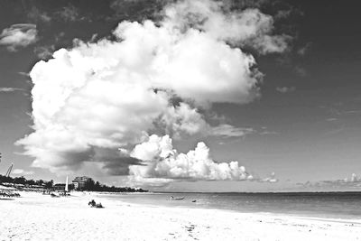 Scenic view of sea against cloudy sky