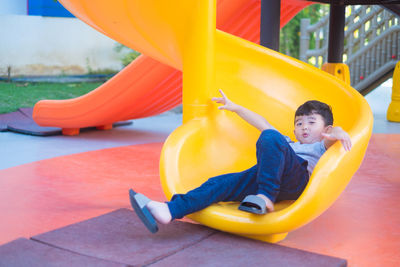 Portrait of boy playing in playground