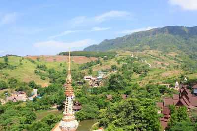 High angle view of agricultural landscape against sky