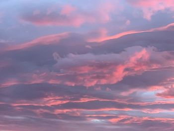 Low angle view of dramatic sky during sunset