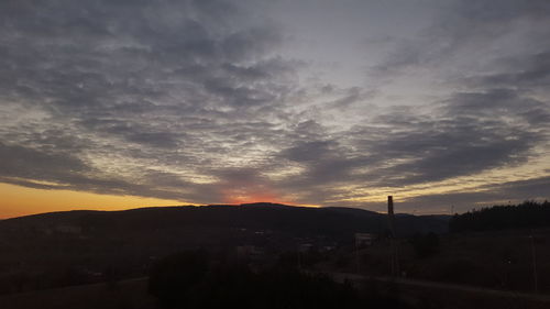 Scenic view of dramatic sky during sunset