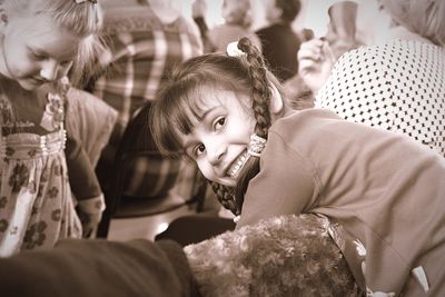 Close-up of woman sitting on chair