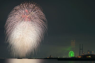 Firework display at night