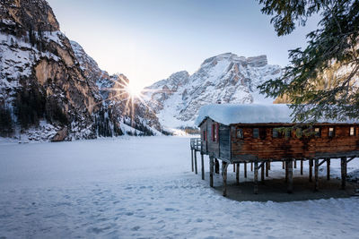 Scenic view of snow covered landscape against sky