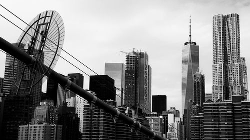 Low angle view of skyscrapers against sky