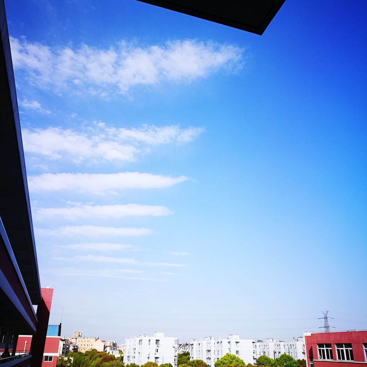 sky, built structure, building exterior, architecture, low angle view, city, no people, outdoors, cloud - sky, tree, day