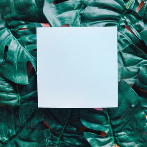 Close-up of laptop on paper