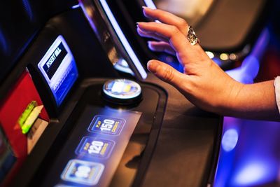 Close-up of hands playing casino