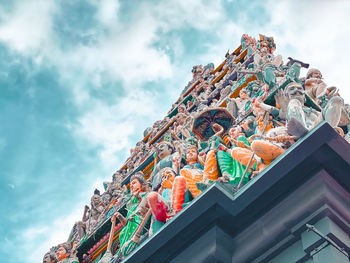 Low angle view of statue against sky