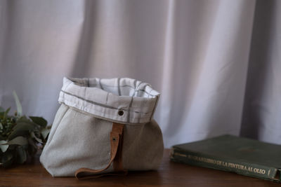 Close-up of book on table at home