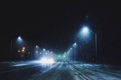 Light trails on road at night