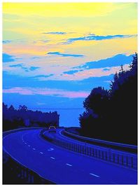 High angle view of road against sky at sunset