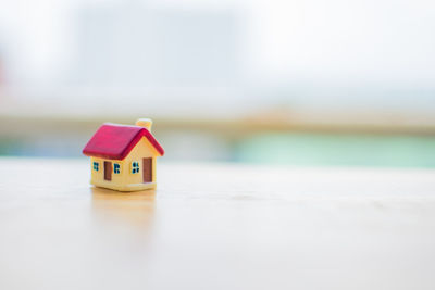 Close-up of model home on table