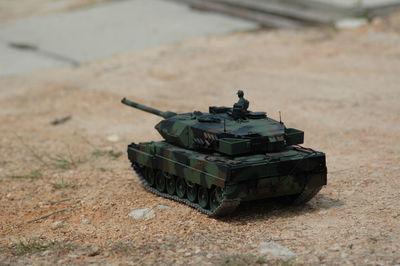 High angle view of toy armored tank on land