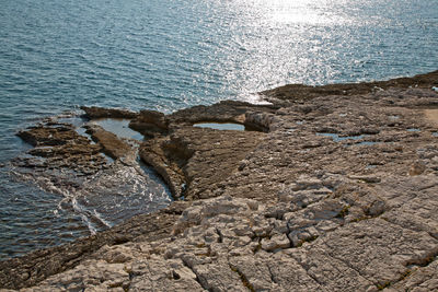 Detail of rock surface washed by the sea for ages. coast line of losinj island, croatia.