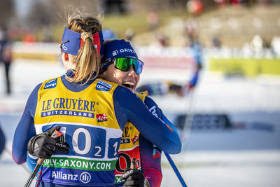Rear view of couple standing outdoors