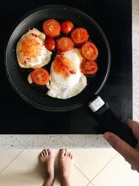 High angle view of hand holding food