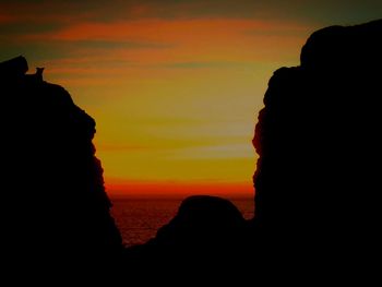 Scenic view of sea at sunset