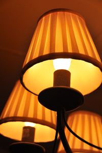 Close-up of illuminated lamp at home