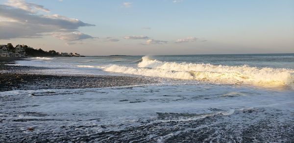 Scenic view of sea against sky during sunset