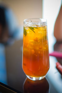 Close-up of beer glass on table