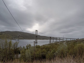 Bridge over land against sky