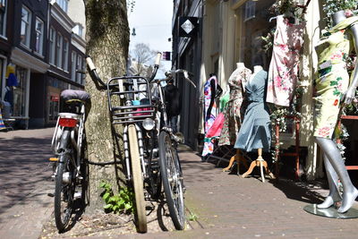 Rear view of people on street in city