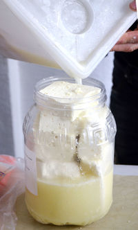 Close-up of drink in glass jar on table