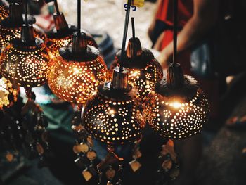 High angle view of illuminated lanterns hanging at market stall