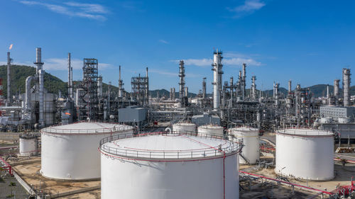 Oil and gas refinery petrochemical plant industrial with oil and gas storage tank, white oil and gas