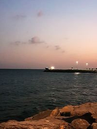 Scenic view of sea at sunset