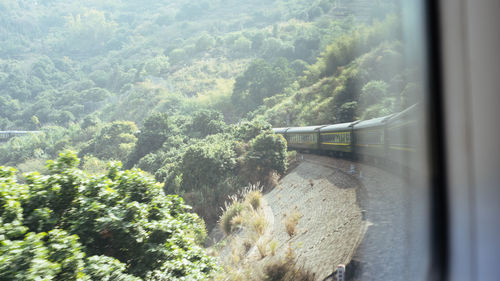 View of train through window