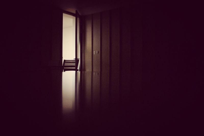 indoors, window, dark, curtain, home interior, copy space, built structure, door, closed, wall - building feature, architecture, house, wall, darkroom, room, shadow, no people, domestic room, simplicity, sunlight