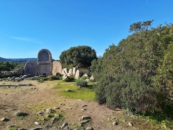 View of old ruins against clear blue sky