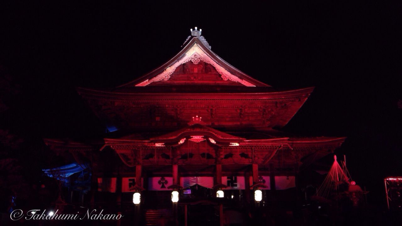 night, illuminated, religion, place of worship, red, spirituality, architecture, built structure, building exterior, low angle view, tradition, temple - building, cultures, famous place, culture, clear sky, travel destinations, church