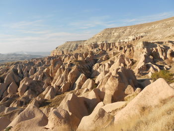 Scenic view of rocky mountains against sky