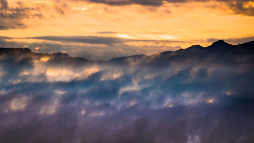 Scenic view of dramatic sky during sunset