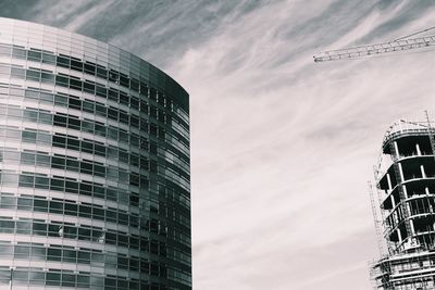 Low angle view of modern buildings against sky