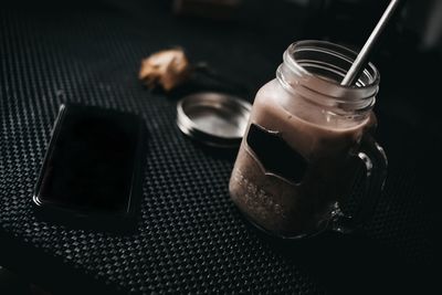 High angle view of drink in glass on table